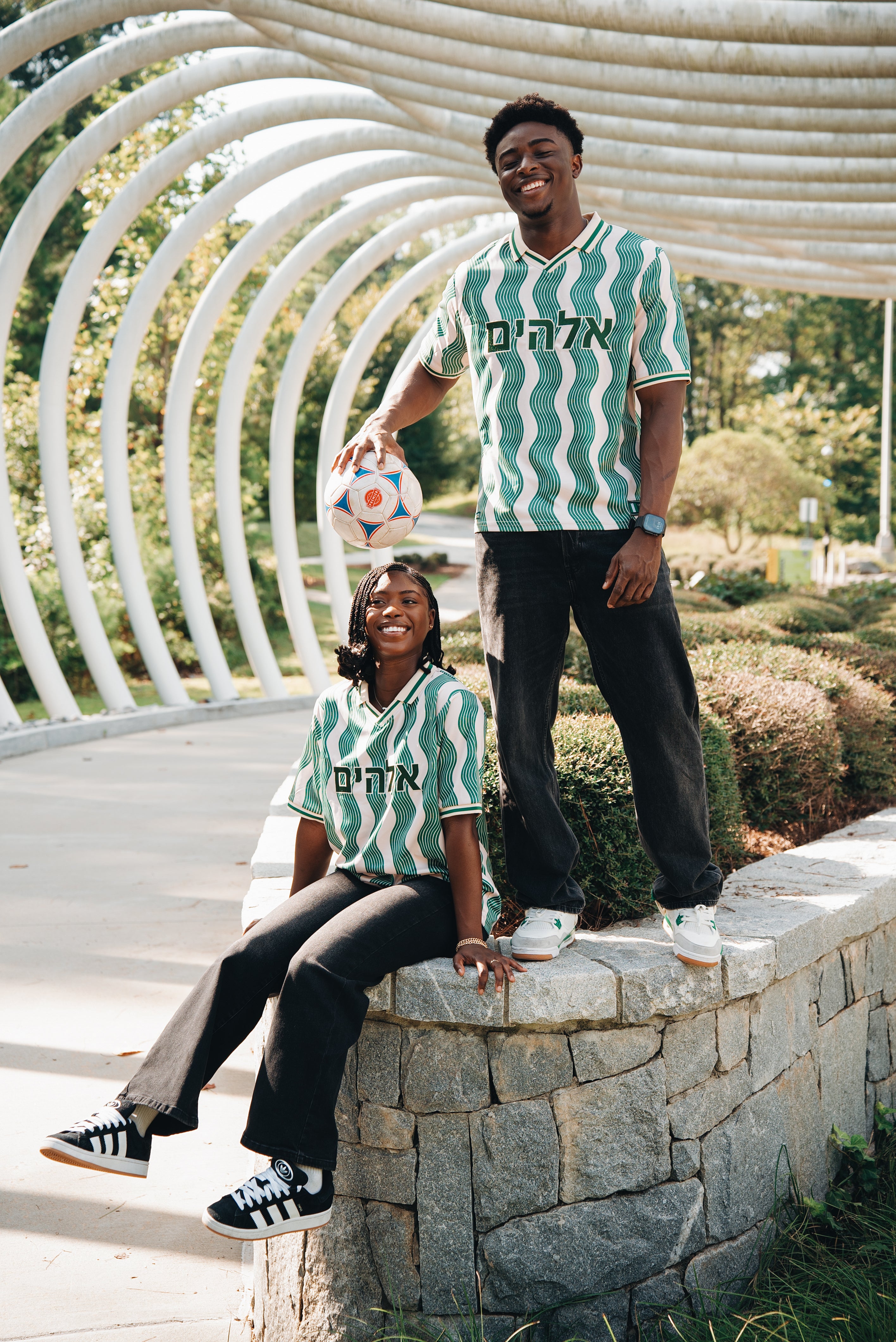 Heritage Jersey — models laughing, back view showing NIGERIA lettering